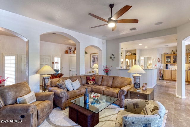 living room with ceiling fan