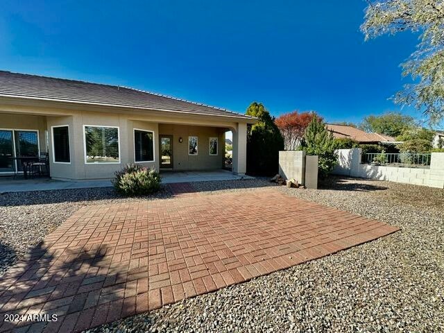 rear view of house featuring a patio