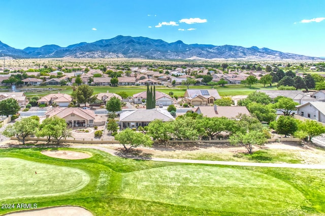 birds eye view of property featuring a mountain view