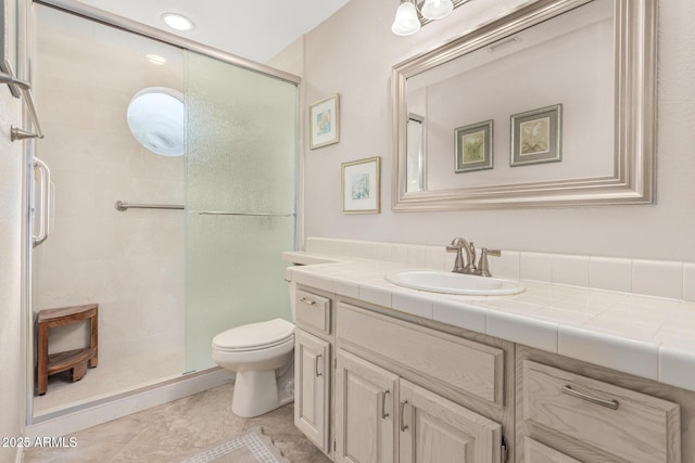 full bath with visible vents, toilet, a stall shower, vanity, and tile patterned flooring