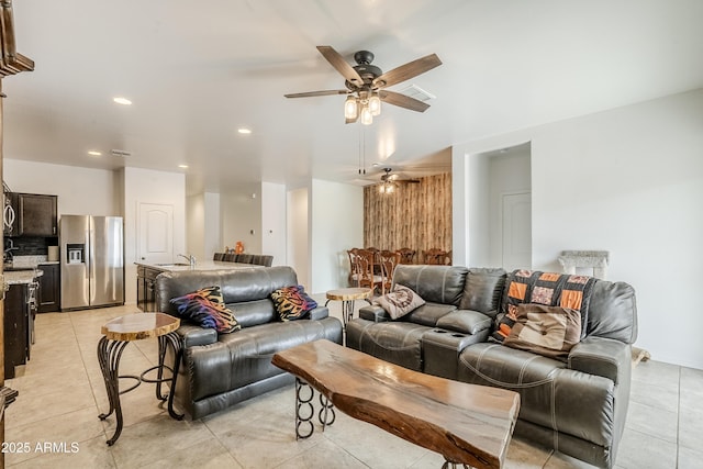 living area with recessed lighting, visible vents, ceiling fan, and light tile patterned flooring