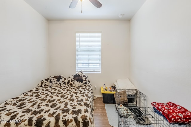 bedroom with wood finished floors