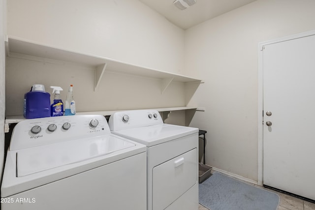 laundry area featuring laundry area, visible vents, and independent washer and dryer