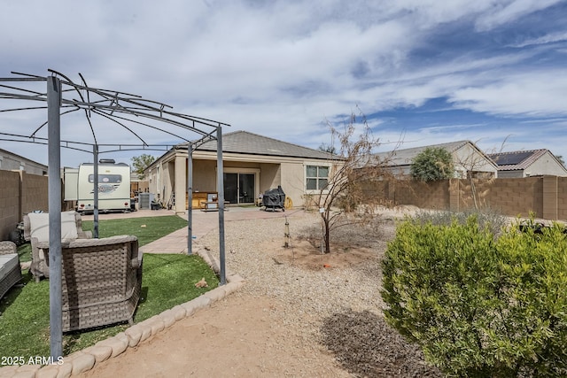 view of yard featuring a patio and a fenced backyard