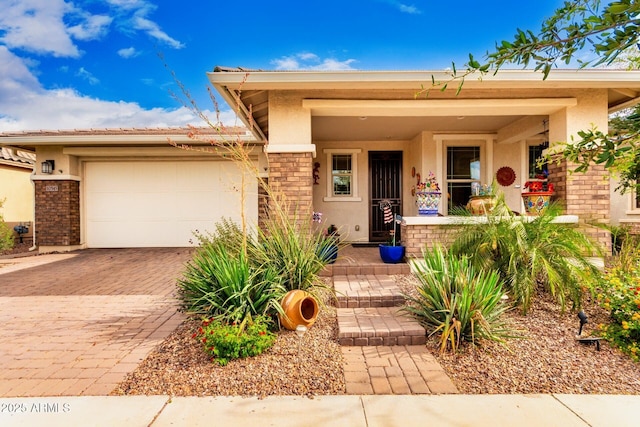 10545 E Texas Ave, Mesa, AZ 85212 - view of front of house with stucco siding, a garage, and decorative driveway