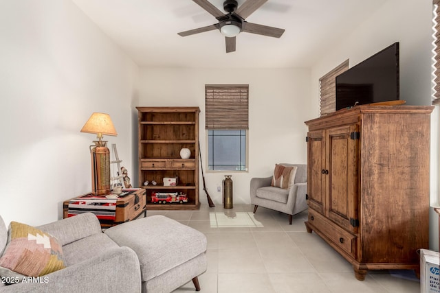10545 E Texas Ave, Mesa, AZ 85212 - living room featuring ceiling fan and light tile patterned flooring