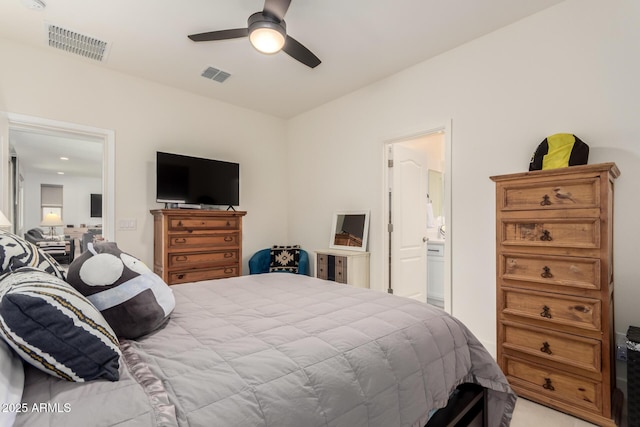 10545 E Texas Ave, Mesa, AZ 85212 - bedroom with connected bathroom and a ceiling fan