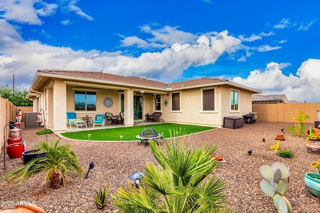 10545 E Texas Ave, Mesa, AZ 85212 - rear view of property featuring stucco siding, a fenced backyard, central AC, and a patio