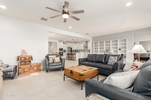 10545 E Texas Ave, Mesa, AZ 85212 - living room featuring ceiling fan, light tile patterned floors, and recessed lighting