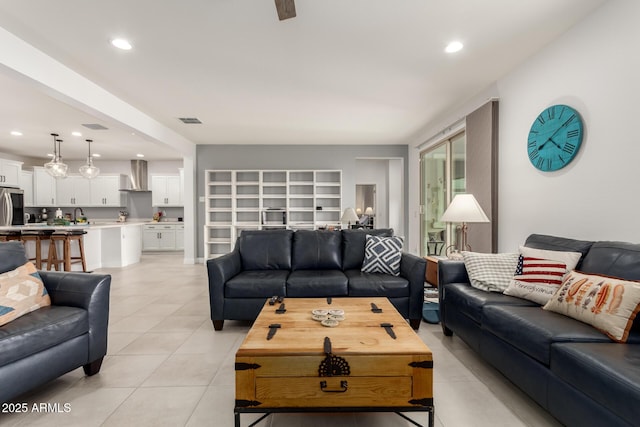 10545 E Texas Ave, Mesa, AZ 85212 - living room with light tile patterned floors and recessed lighting