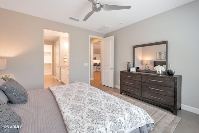16935 W Sheridan St, Goodyear, AZ 85395 - bedroom featuring baseboards, a ceiling fan, and ensuite bath