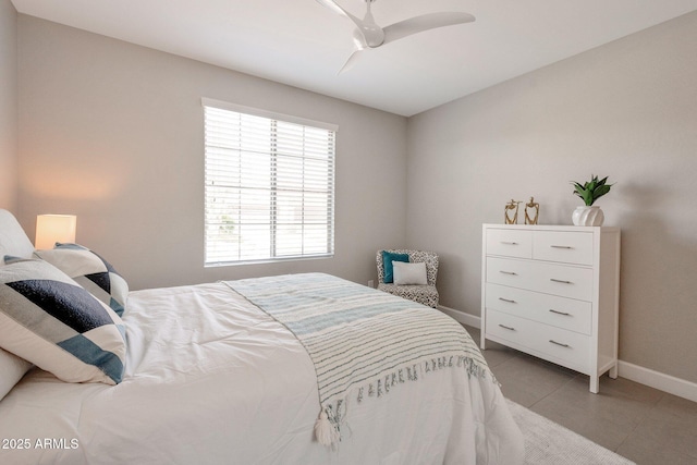16935 W Sheridan St, Goodyear, AZ 85395 - bedroom featuring baseboards, light tile patterned floors, and ceiling fan