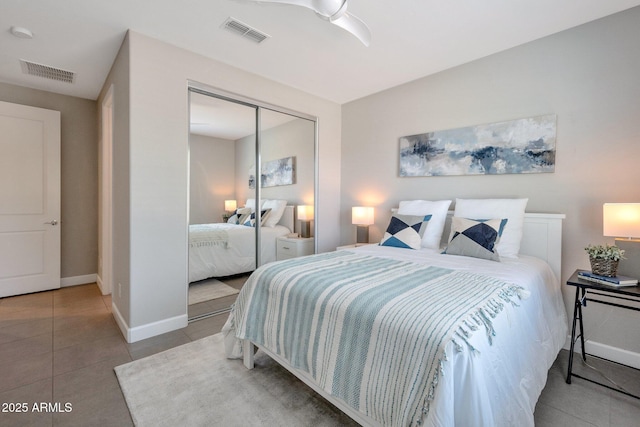 16935 W Sheridan St, Goodyear, AZ 85395 - bedroom with a closet, tile patterned floors, and baseboards
