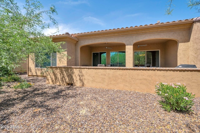 16935 W Sheridan St, Goodyear, AZ 85395 - view of side of home featuring stucco siding