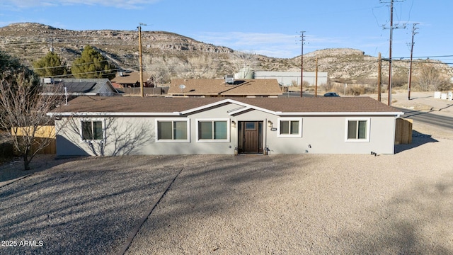 rear view of house with a mountain view