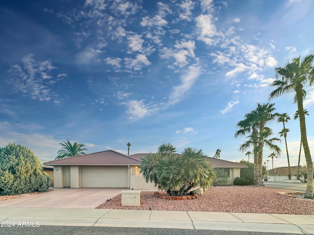 view of front of property with a garage