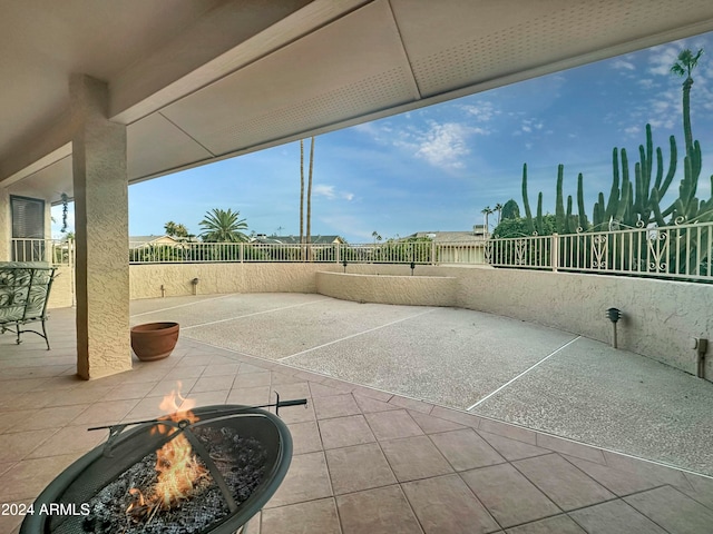 view of patio featuring a fire pit