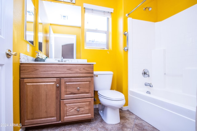 full bathroom with tile patterned flooring, vanity,  shower combination, and toilet