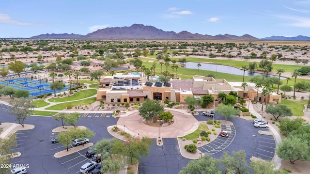 birds eye view of property featuring a mountain view