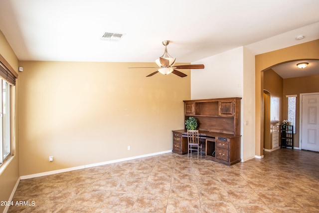 interior space with ceiling fan