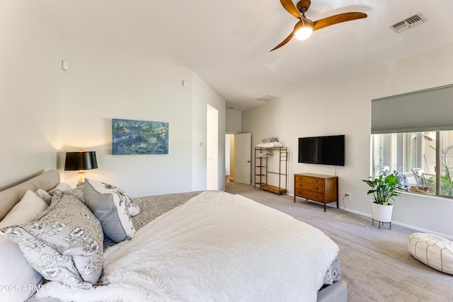 bedroom featuring light carpet and ceiling fan