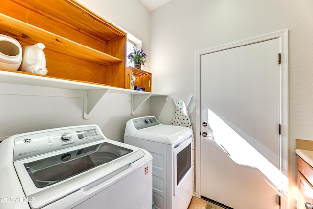 laundry area with washer and dryer