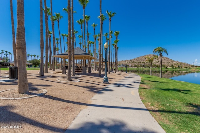 view of home's community with a gazebo and a water and mountain view