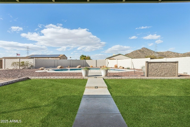 view of yard featuring a fenced backyard and a fenced in pool