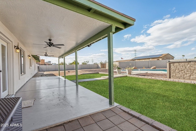 view of patio / terrace featuring a fenced backyard, a ceiling fan, and a fenced in pool