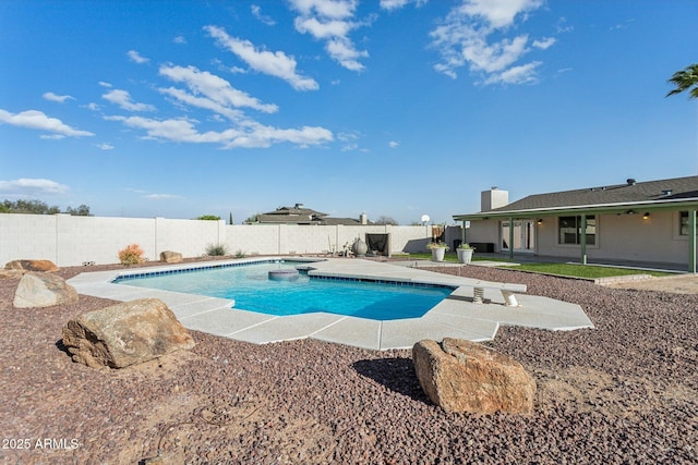 view of pool with a fenced backyard, a fenced in pool, and a patio