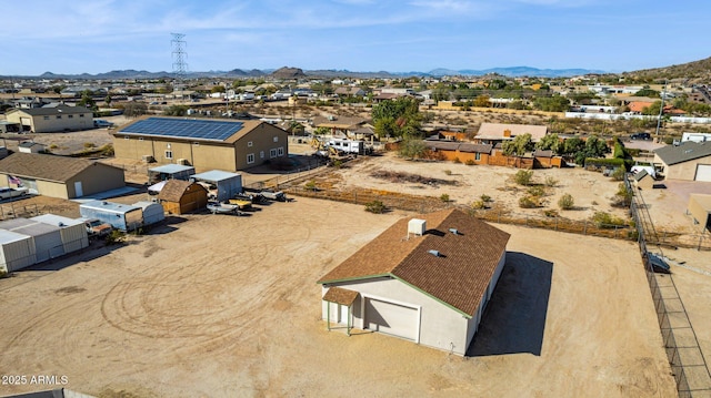 drone / aerial view with a residential view and a mountain view