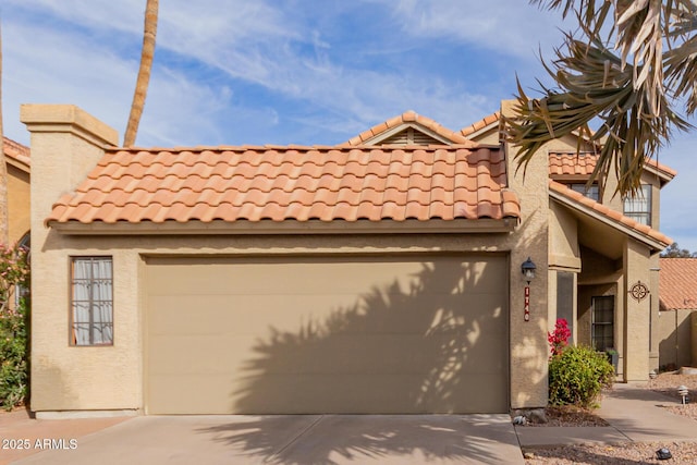 view of front of property with a garage