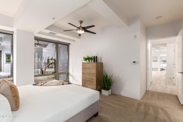 bedroom with light carpet and ceiling fan