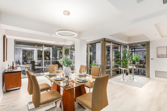 dining space featuring light hardwood / wood-style flooring