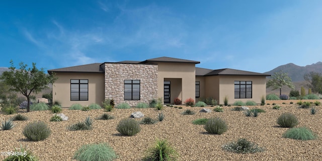 view of front of home featuring a mountain view