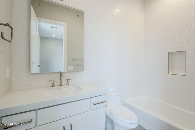 full bathroom with vanity, toilet, and shower / bathing tub combination