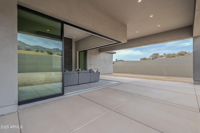 view of patio featuring a mountain view