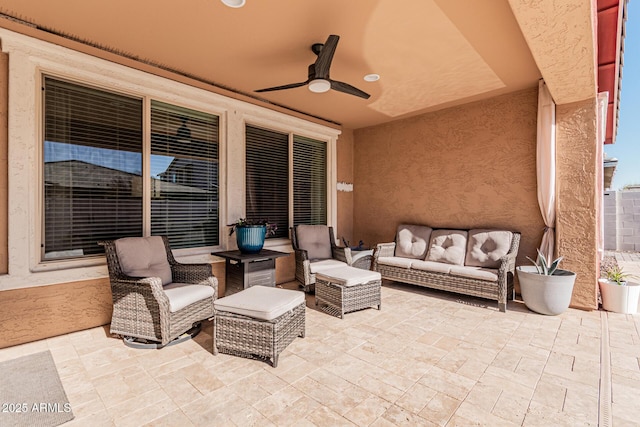 view of patio featuring outdoor lounge area and ceiling fan