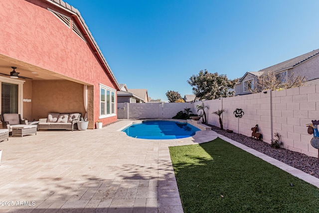 view of swimming pool with outdoor lounge area, ceiling fan, and a patio