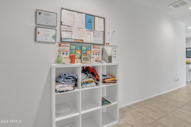 interior space featuring light tile patterned flooring