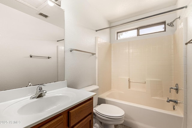 full bath with visible vents,  shower combination, toilet, and vanity