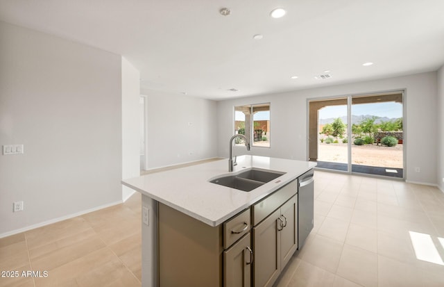 26995 W Adam Ave, Buckeye, AZ 85396 - kitchen with a sink, stainless steel dishwasher, a kitchen island with sink, gray cabinetry, and light tile patterned floors