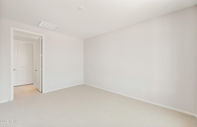 26995 W Adam Ave, Buckeye, AZ 85396 - spare room with light colored carpet and baseboards
