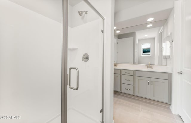 26995 W Adam Ave, Buckeye, AZ 85396 - bathroom with a stall shower, double vanity, recessed lighting, and tile patterned floors