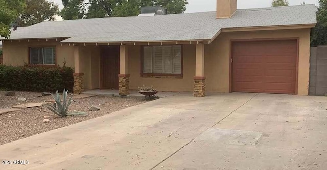 single story home featuring a garage