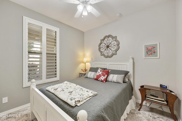 bedroom featuring light wood-type flooring and ceiling fan