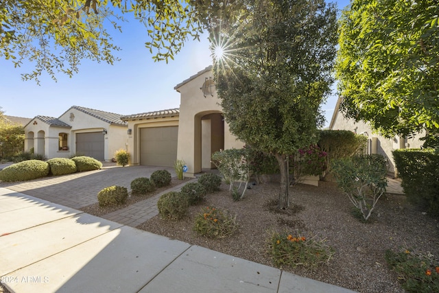 view of front of property with a garage