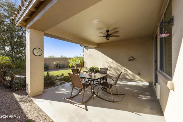 view of patio featuring ceiling fan