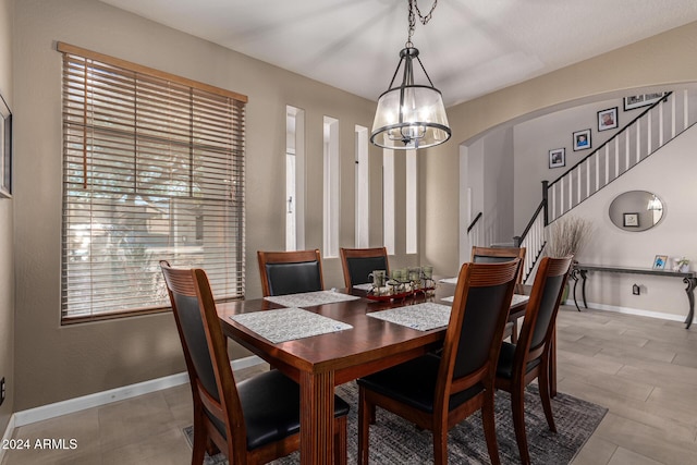 dining room featuring a notable chandelier