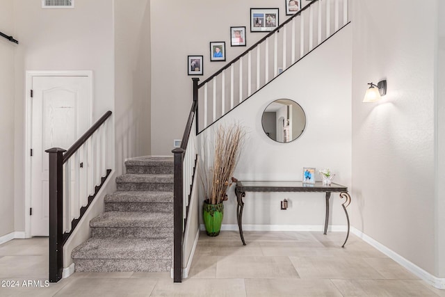 stairway with a high ceiling